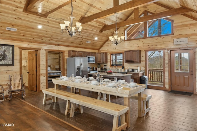 3316 Grace Way, Sevierville, TN 37876 - dining room with a chandelier, wooden walls, high vaulted ceiling, wooden ceiling, and beam ceiling