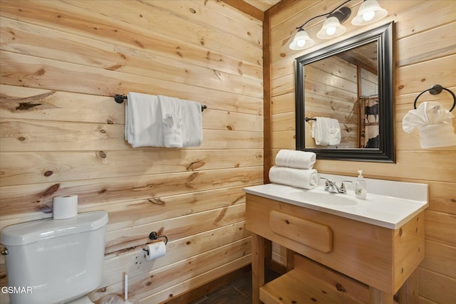 3316 Grace Way, Sevierville, TN 37876 - bathroom featuring wood walls, toilet, and vanity