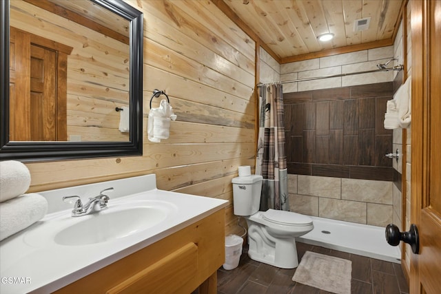 3316 Grace Way, Sevierville, TN 37876 - full bathroom with wood walls, toilet, a shower stall, vanity, and wooden ceiling