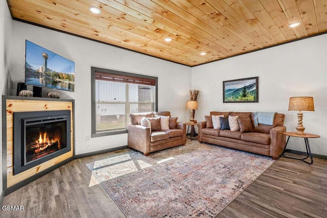1105 Center St # 3, Sevierville, TN 37862 - living area featuring wood ceiling, wood finished floors, recessed lighting, and a glass covered fireplace