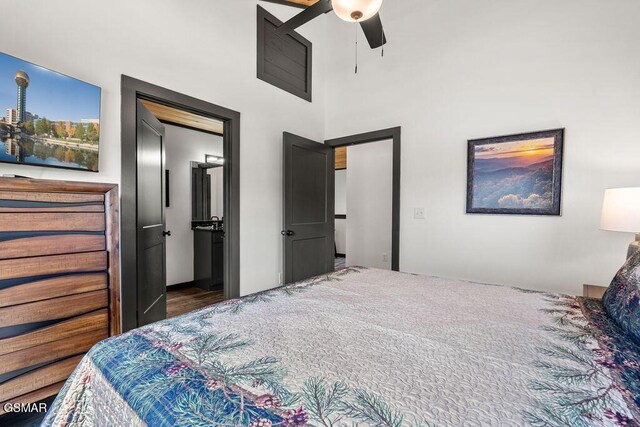 1105 Center St # 3, Sevierville, TN 37862 - bedroom with a towering ceiling, a ceiling fan, and ensuite bath