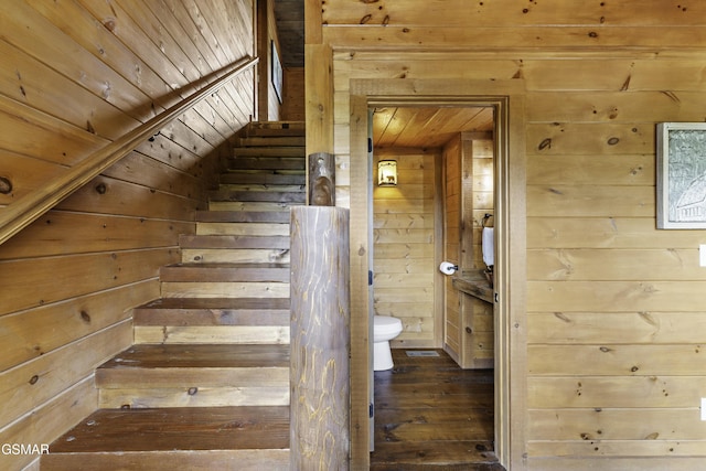 4427 Stackstone Rd, Sevierville, TN 37862 - stairway with wooden walls, wood-type flooring, and wooden ceiling