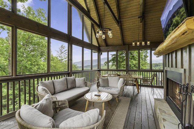 4427 Stackstone Rd, Sevierville, TN 37862 - sunroom with an outdoor living space with a fireplace and a mountain view