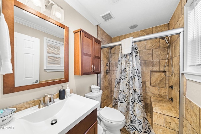 full bathroom featuring visible vents, toilet, a shower stall, crown molding, and vanity