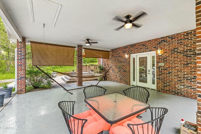 view of patio / terrace with outdoor dining space and ceiling fan