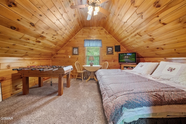carpeted bedroom featuring vaulted ceiling, wood walls, and wood ceiling
