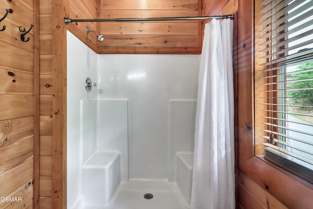 bathroom with curtained shower