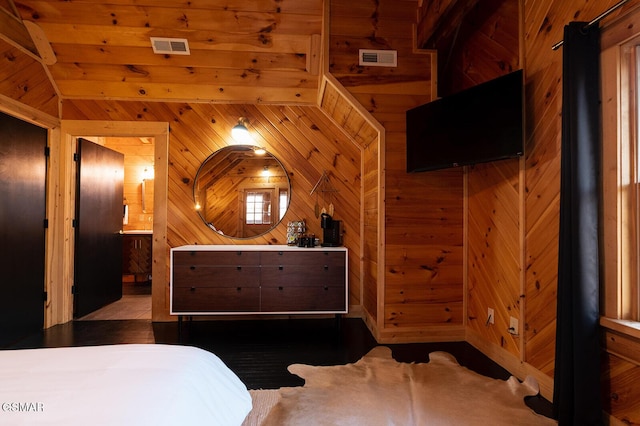1317 Old Knoxville Hwy, Sevierville, TN 37876 - bedroom featuring wooden walls and ensuite bath