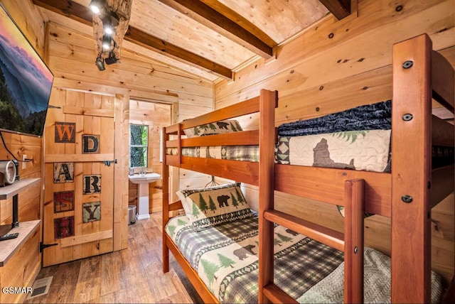 3110 Cove Creek Way, Sevierville, TN 37862 - bedroom featuring wooden walls and wood-type flooring