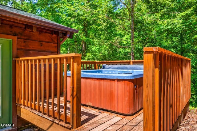 3110 Cove Creek Way, Sevierville, TN 37862 - deck featuring a hot tub and a forest view