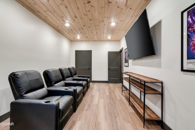 home theater with wooden ceiling and light hardwood / wood-style flooring