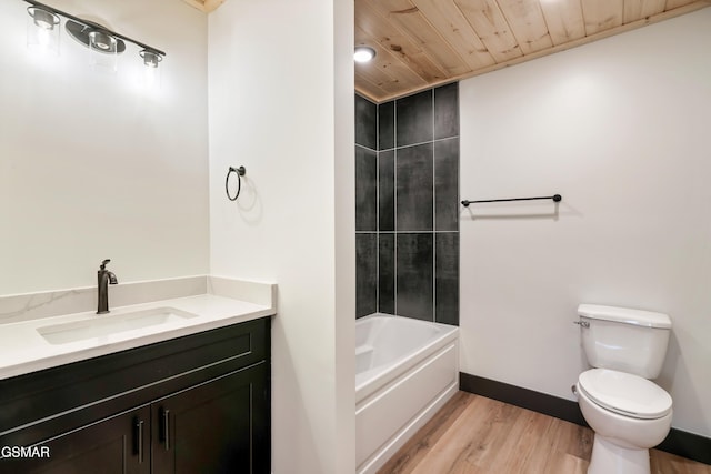 bathroom featuring vanity, hardwood / wood-style floors, wooden ceiling, and toilet