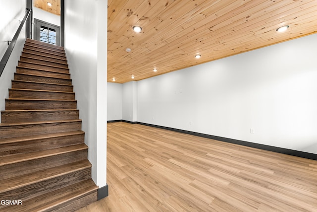 interior space with hardwood / wood-style floors and wood ceiling