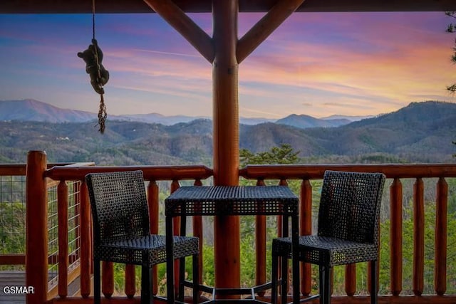 balcony featuring a mountain view