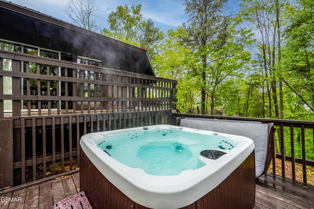 1923 E Arolla Ct, Gatlinburg, TN 37738 - wooden terrace with a hot tub