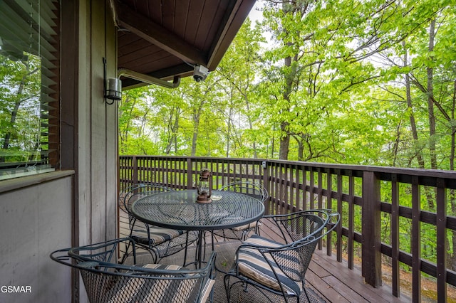 1923 E Arolla Ct, Gatlinburg, TN 37738 - view of wooden balcony featuring a deck and outdoor dining area