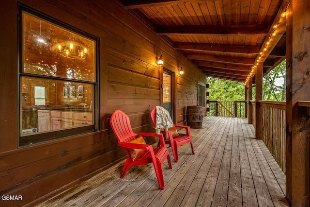 wooden terrace featuring a porch