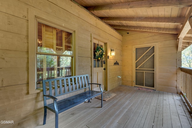 doorway to property featuring covered porch