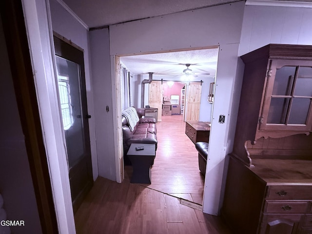 hallway with light wood-type flooring