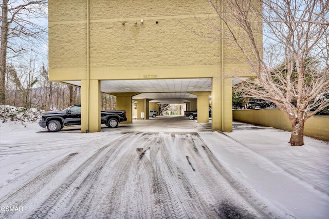 exterior space with a carport