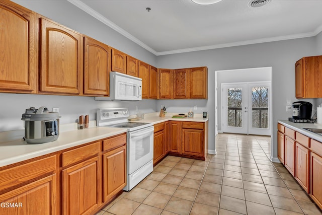 kitchen featuring french doors, white appliances, ornamental molding, and light tile patterned floors