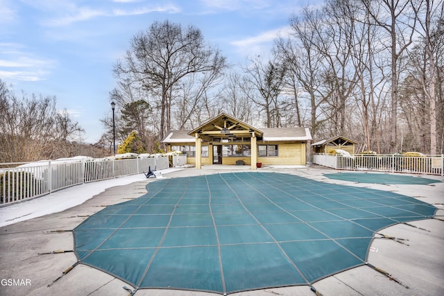 view of swimming pool featuring a patio area