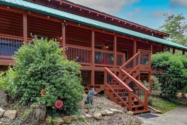 1707 Ridgecrest Dr, Sevierville, TN 37876 - rear view of house featuring metal roof and stairs