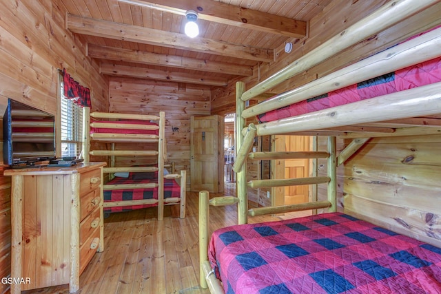 1707 Ridgecrest Dr, Sevierville, TN 37876 - unfurnished bedroom with wooden ceiling with exposed beams, hardwood / wood-style floors, and wood walls