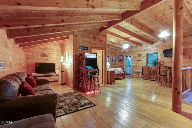 1707 Ridgecrest Dr, Sevierville, TN 37876 - living area featuring wood ceiling, wooden walls, light wood-style flooring, and a ceiling fan