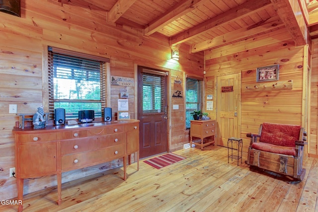 1707 Ridgecrest Dr, Sevierville, TN 37876 - foyer entrance with wooden ceiling with exposed beams, light wood-type flooring, and wood walls