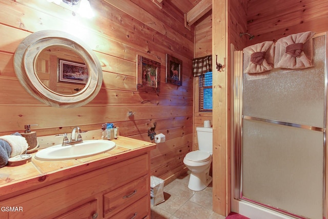 1707 Ridgecrest Dr, Sevierville, TN 37876 - full bath with wooden walls, vanity, a shower stall, toilet, and tile patterned flooring