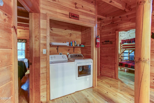 1707 Ridgecrest Dr, Sevierville, TN 37876 - washroom with independent washer and dryer, wooden walls, light wood finished floors, and wood ceiling