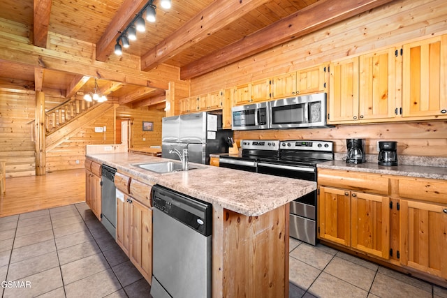 kitchen with light tile patterned floors, wood ceiling, light countertops, a sink, and stainless steel appliances
