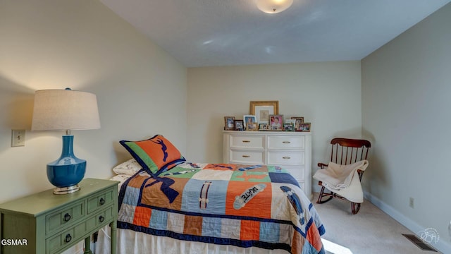 bedroom with light carpet