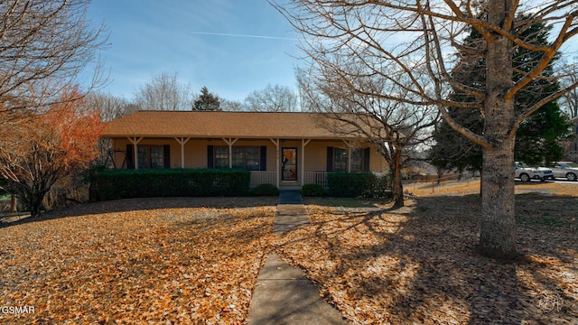 ranch-style house featuring a porch