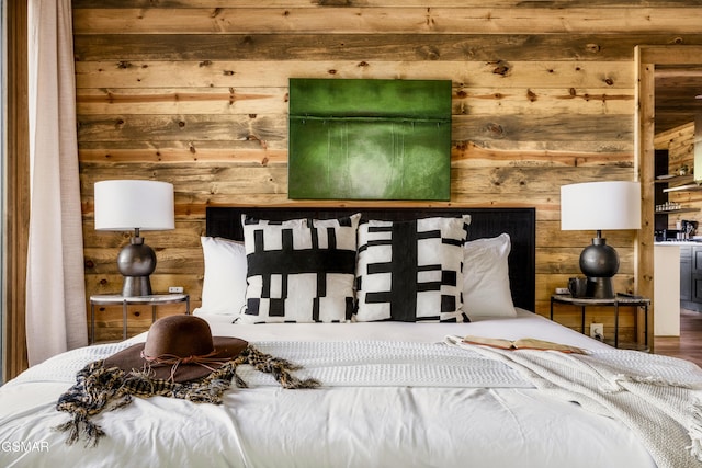 bedroom with wooden walls