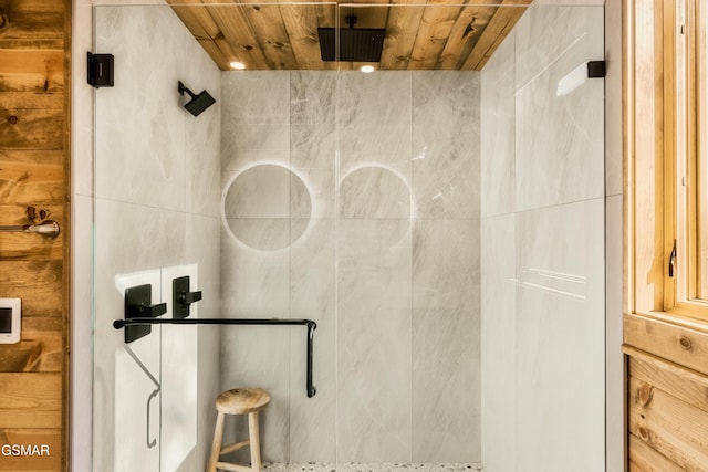 bathroom with an enclosed shower and wooden ceiling