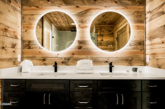 full bathroom featuring double vanity, a sink, and wooden walls