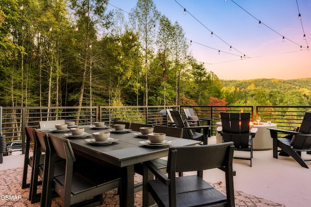 patio terrace at dusk with a balcony