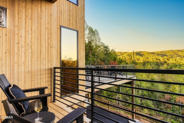 balcony with a forest view