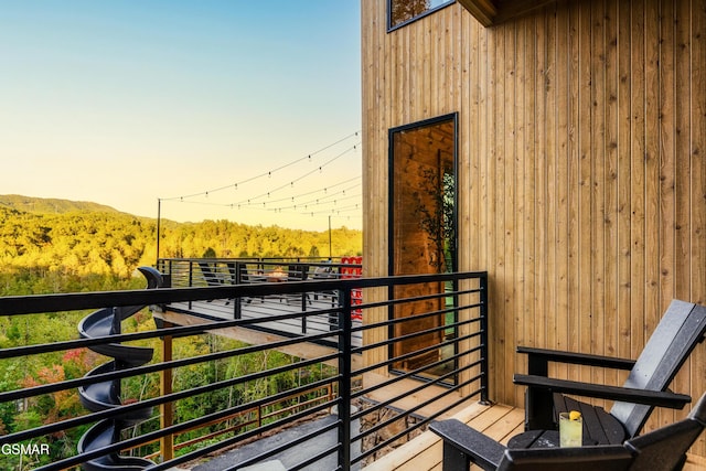 balcony with a forest view