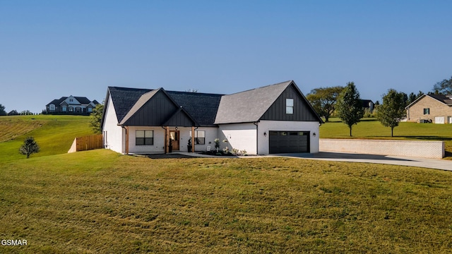 modern inspired farmhouse with board and batten siding, a front yard, brick siding, and a garage