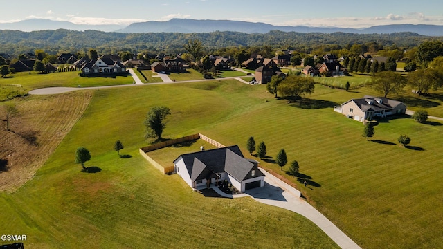 bird's eye view with a residential view and a mountain view