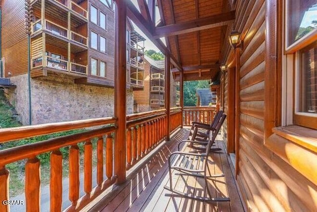 wooden deck featuring a porch