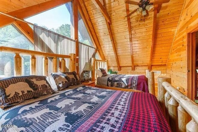 bedroom featuring vaulted ceiling with beams, wood ceiling, and multiple windows