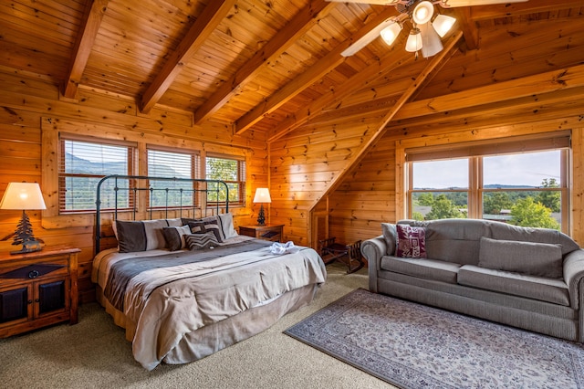 bedroom featuring carpet flooring, vaulted ceiling with beams, wooden ceiling, and wood walls