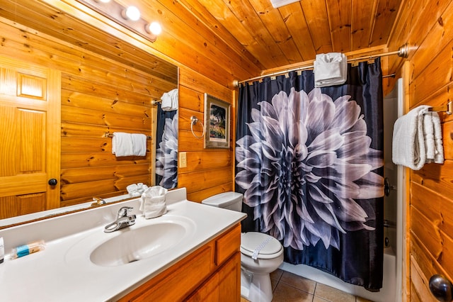 full bathroom with tile patterned floors, toilet, wood walls, wooden ceiling, and vanity