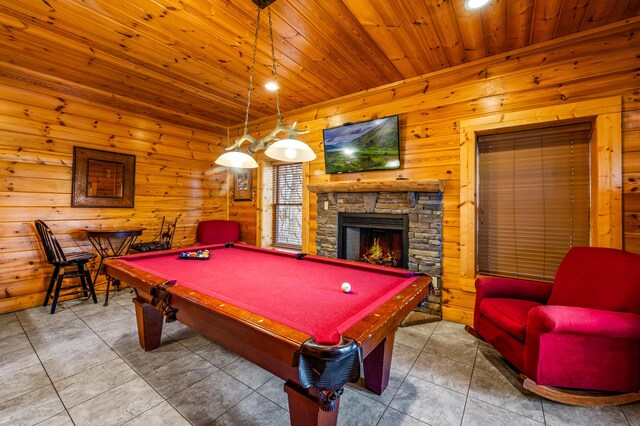 playroom with wood ceiling, pool table, tile patterned floors, and a fireplace