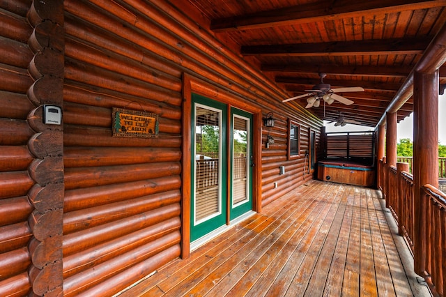 deck featuring ceiling fan and a porch