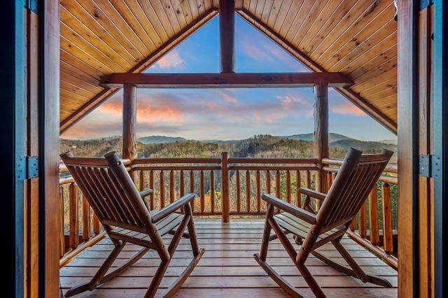 deck at dusk with a mountain view